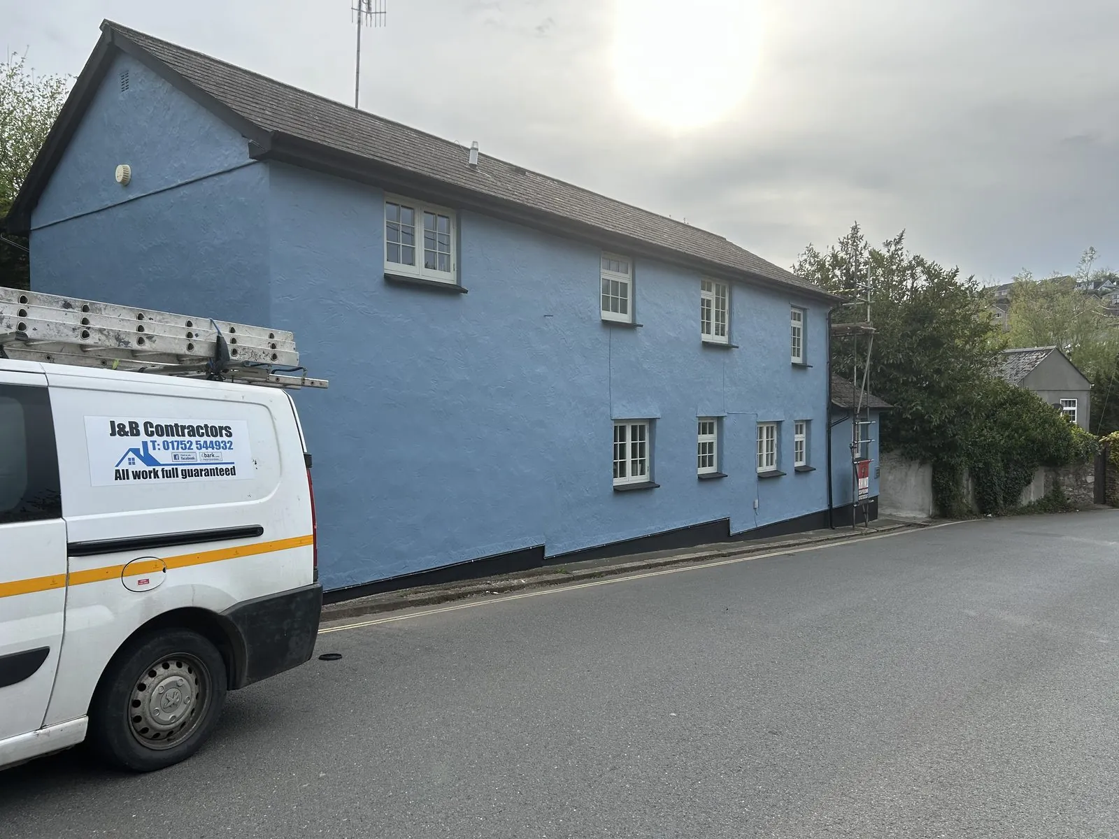 Exterior painting of a detached house in Axminster