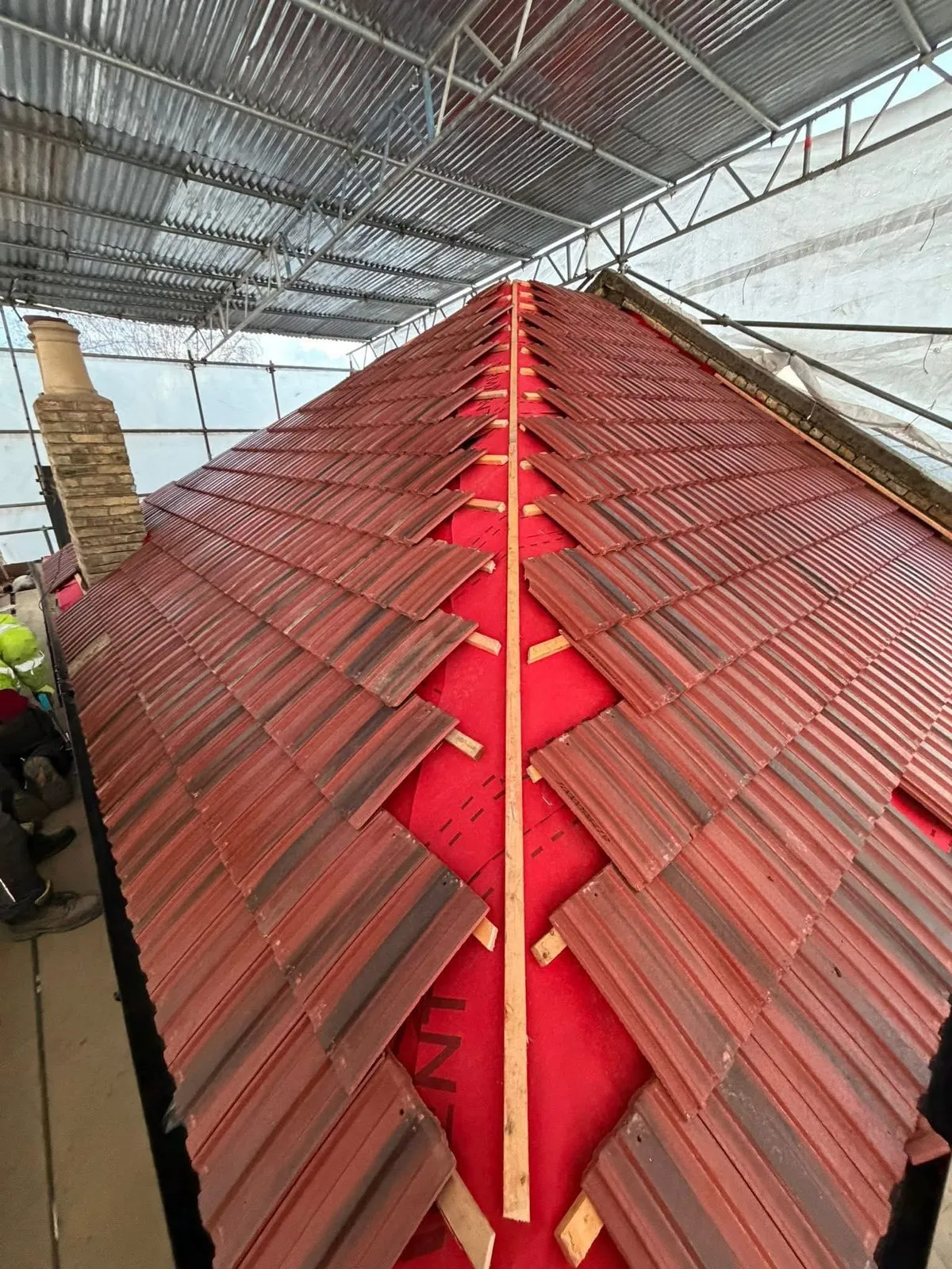 Complete roof replacement with new clay tiles in Axminster