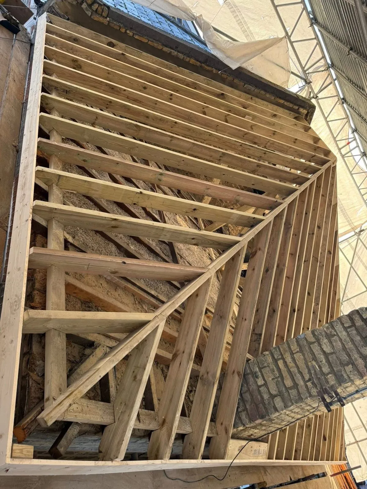 New roof timbers and rafters during a re-roof in Axminster